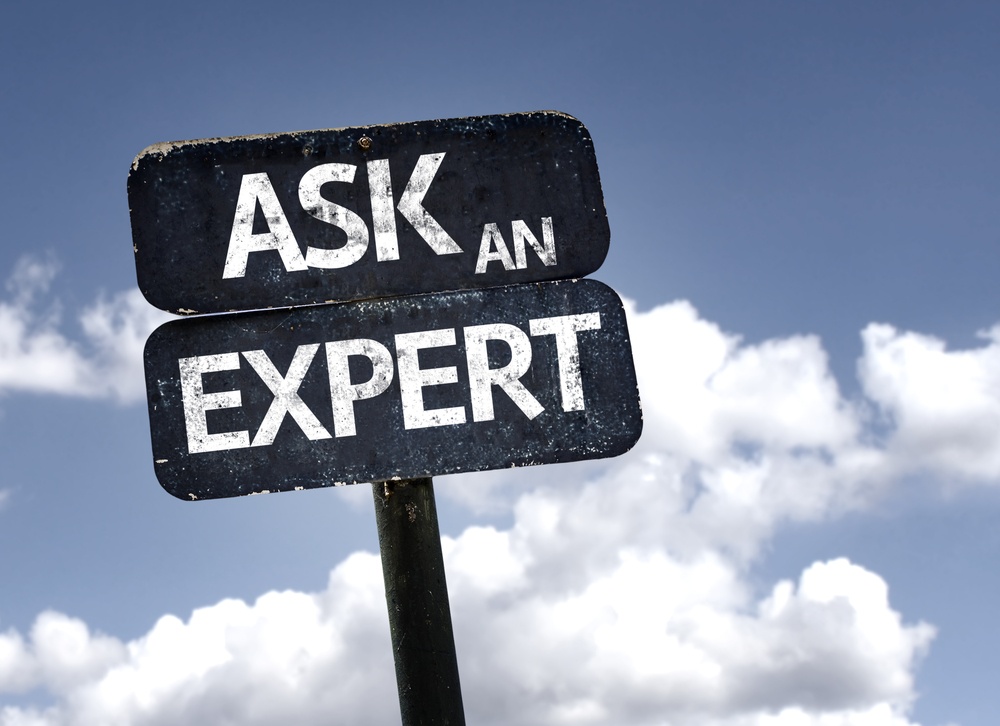 Ask An Expert sign with clouds and sky background .jpeg