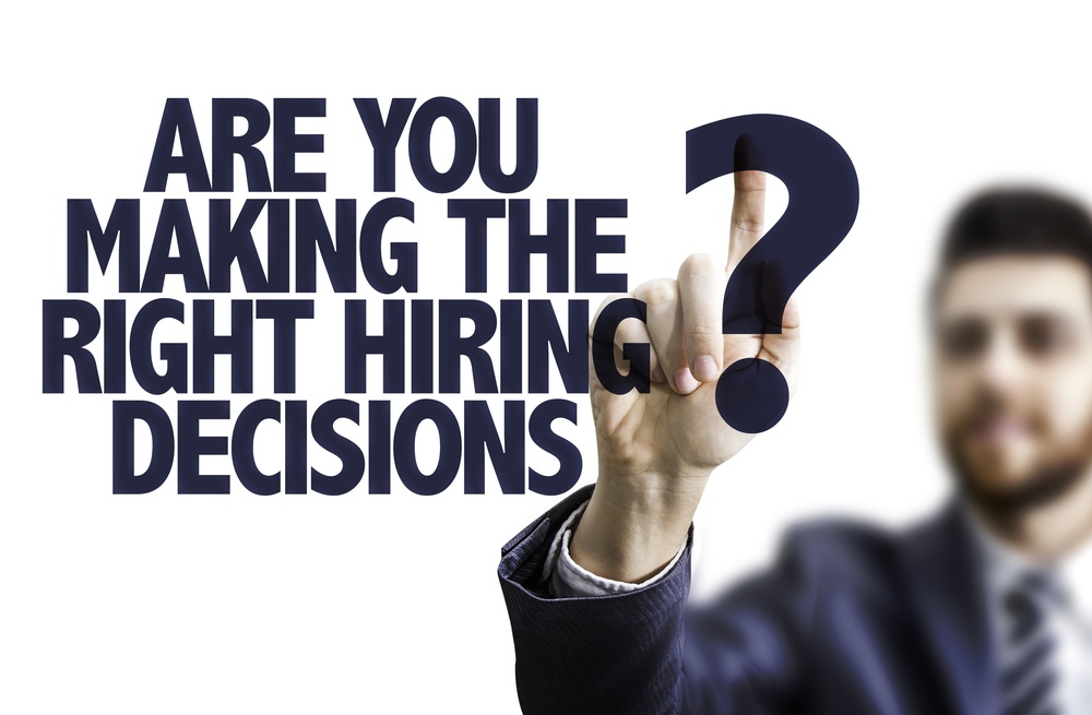 Business man pointing the text Are You Making the Right Hiring Decisions?.jpeg